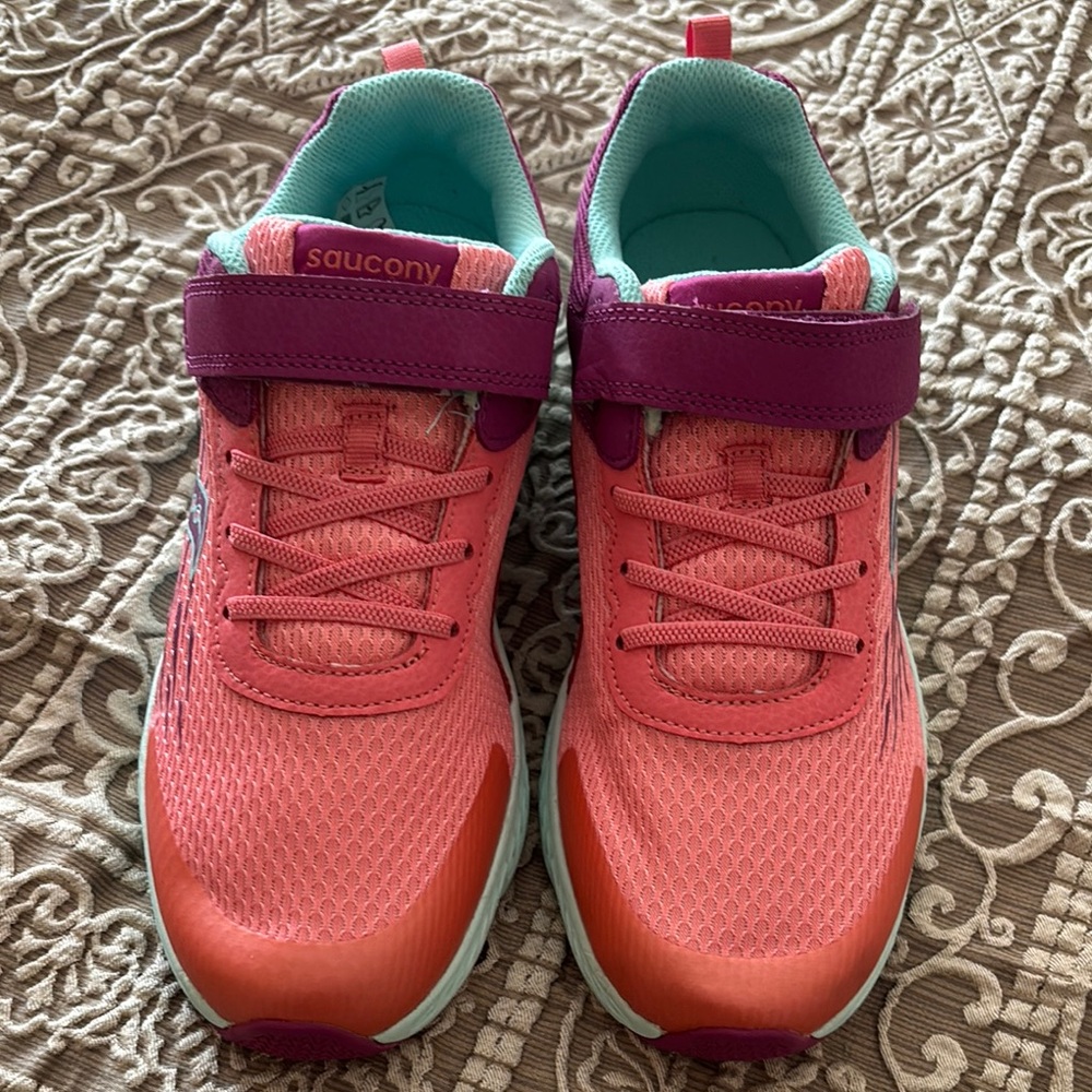 Saucony Pink and Purple Athletic Sneakers with Breathable Upper.